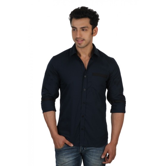 Get you Party on with this Navy Blue Slim Fit Shirt for men. Solid color shirt with contrasting Black fabric under the Cuffs and Collar band. Square chest pocket with a black stripe and square cuffs. Slim fit shirt with mill made cotton fabric. Contrasting Black Buttons.   Color: Navy Blue. Black Under Cuffs, Collar Band and Pocket Strip Fabric: 100% Cotton Mill Made Fit: Slim Fit with Long Sleeves Button: Black Buttons